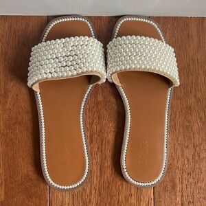 Inc. pearl embellished slides